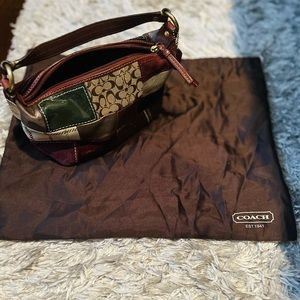 Coach Multicolor Patchwork Canvas/Leather/Suede and Calfhair Pochette. 9”W x 5”H